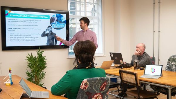 A photograph of a digital skills training session taking place. 